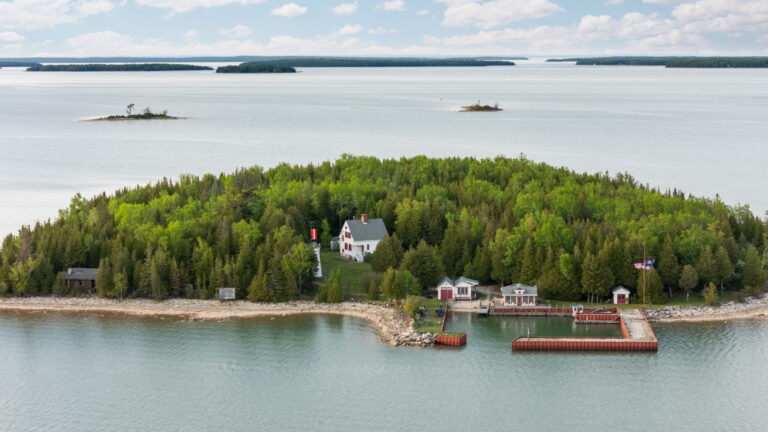 Aerial view of South Pipe Island, a 13.56-acre private island in northern Lake Huron near De Tour Village, Michigan.